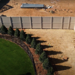 Transforming Westerly Apartments with Adobe Fence Design